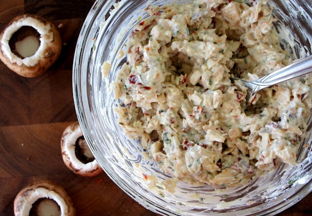 A bowl of mixed ingredients needed for stuffed mushrooms 