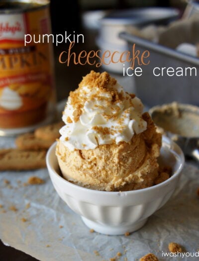 Two scoops Pumpkin Cheesecake ice Cream in a bowl topped with whipped cream
