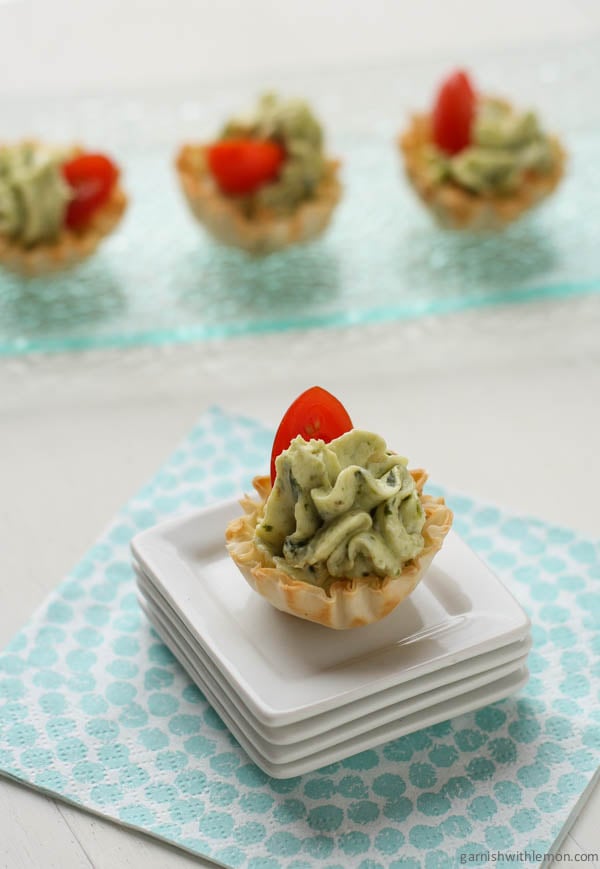 A close up of a mini tart appetizer