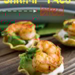 Shrimp in mini taco shells titled, "Shrimp Taco bites!"