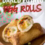 These Loaded Baked Potato Egg Rolls are the perfect appetizer recipe for game day! Great with leftover mashed potatoes too!