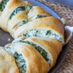 This Cheesy Spinach Jalapeño Crescent Ring is loaded with cream cheese, monterey jack cheese, spinach and diced pickled jalapeños. It's so easy to make and EVERYONE loves it!