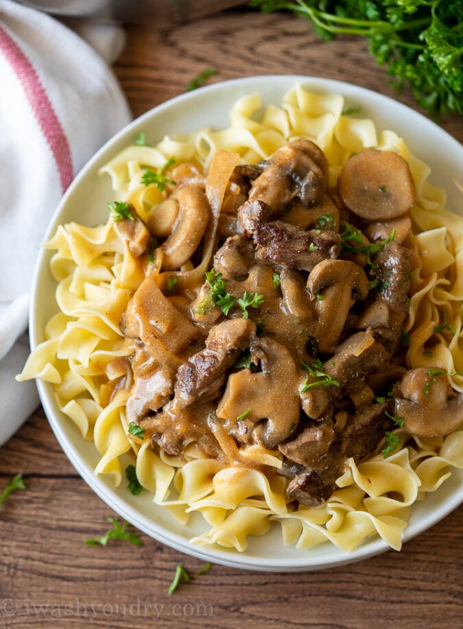 Homemade Beef Stroganoff Recipe over egg noodles.
